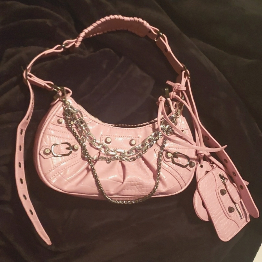 Pink crocodile purse with studs